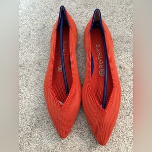 Rothy's Pointed Knit Flats in Vibrant Orange with Navy Trim